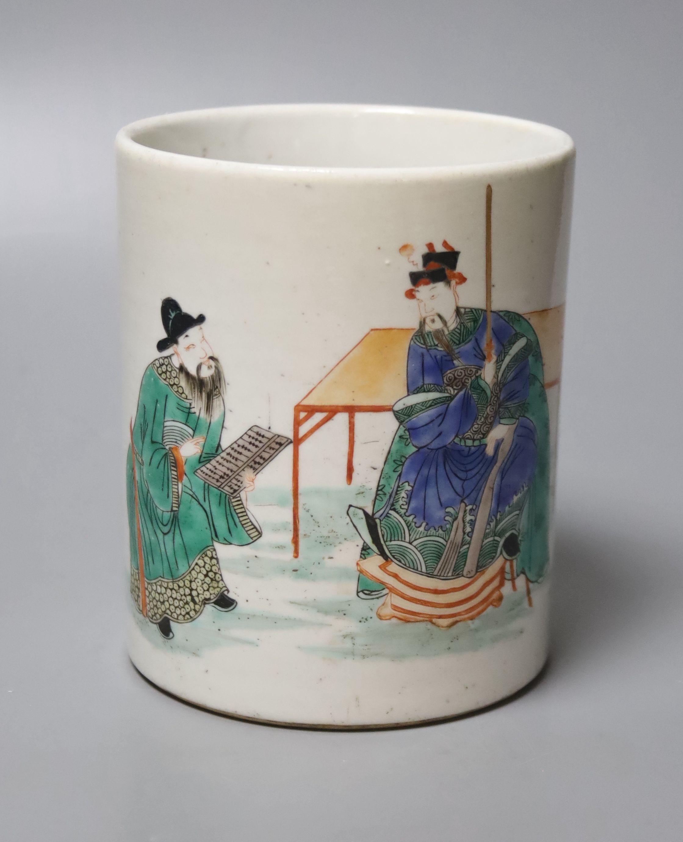 A Chinese famille verte brush pot, depicting two scholars in conversation, probably Republic period, 12.5cm high